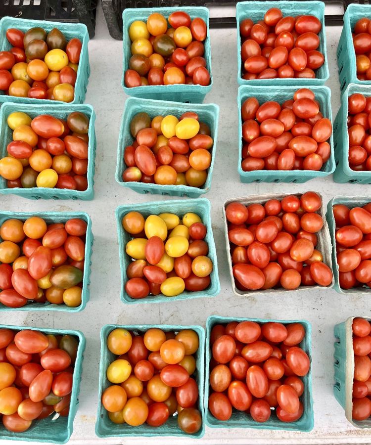 Pints of red and yellow cherry tomatoes