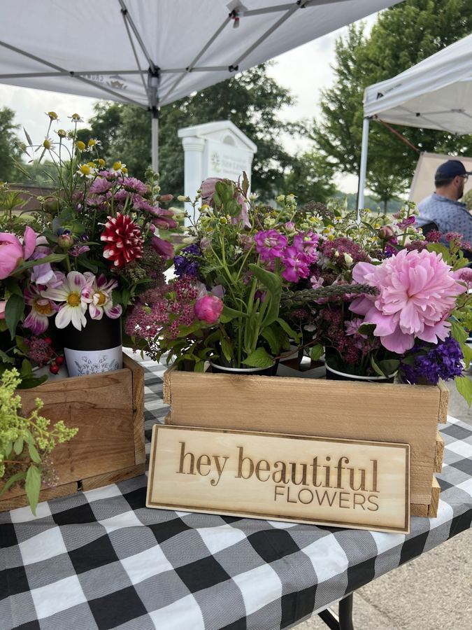 Fresh cut flower arrangements in a wooden crate